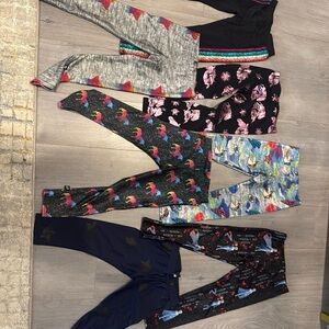 7 pairs of size large Terez leggings.  Great condition.  So cute!